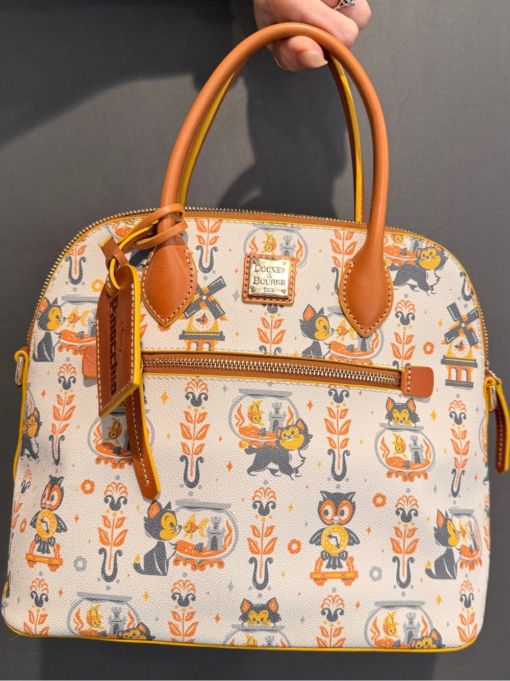Dooney & Bourke Disney’s Pinocchio Cream Satchel with Tan & Yellow Trim